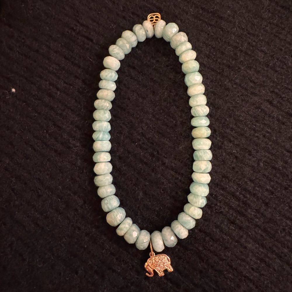 Elegant Blue Beaded Necklace with Gold Elephant Charm